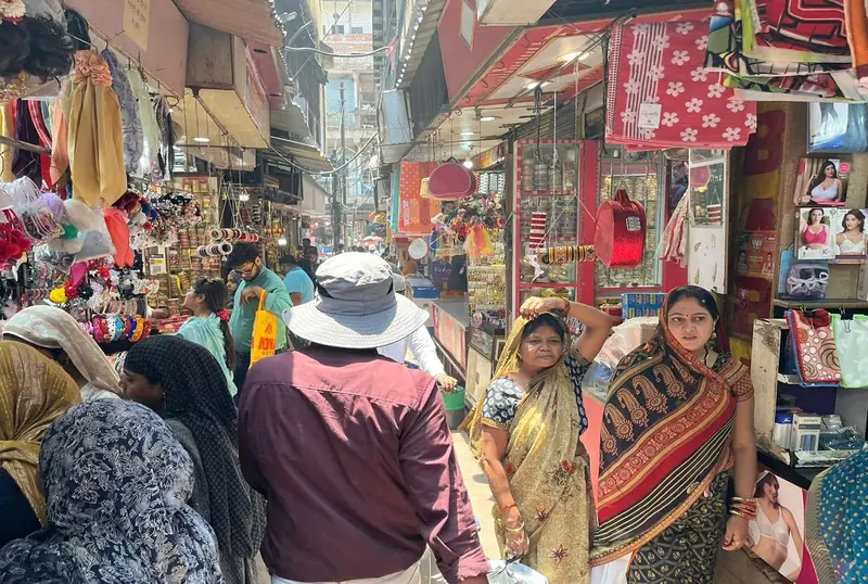Shoppers in the narrow lanes of Kinari Bazaar, Agra