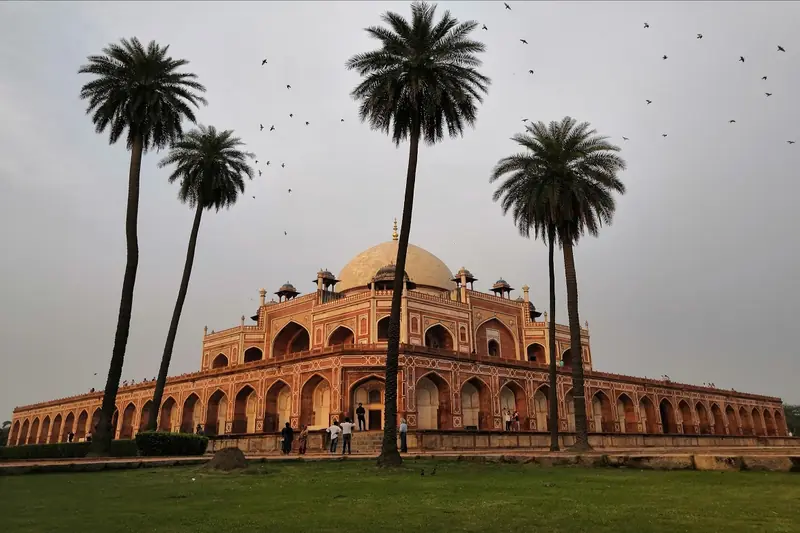 Humayun's Tomb in Delhi framed by palm trees