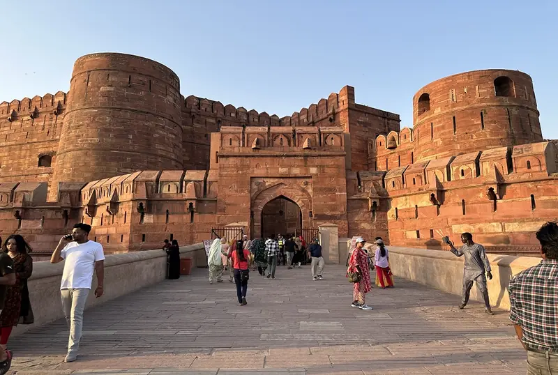 Visitors walking up to the Amar Singh Gate of Agra Fort