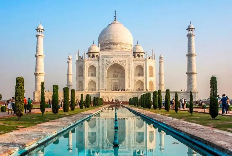 The Taj Mahal reflected in the long garden pool